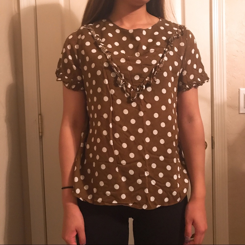 Brown shirt with white polka dots
